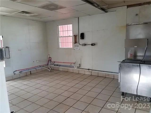 a view of a truck parked in a yard