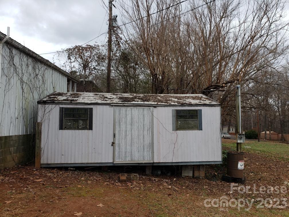 286 Chimney Rock Road Rutherfordton, NC 28139 - Photo 26 of 31 a view of a truck parked in a yard