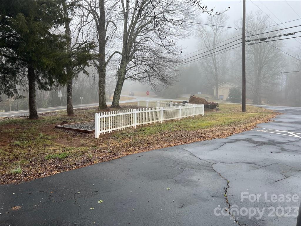 286 Chimney Rock Road Rutherfordton, NC 28139 - Photo 28 of 31 a view of a backyard with large trees