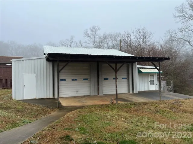 a house view with a backyard space