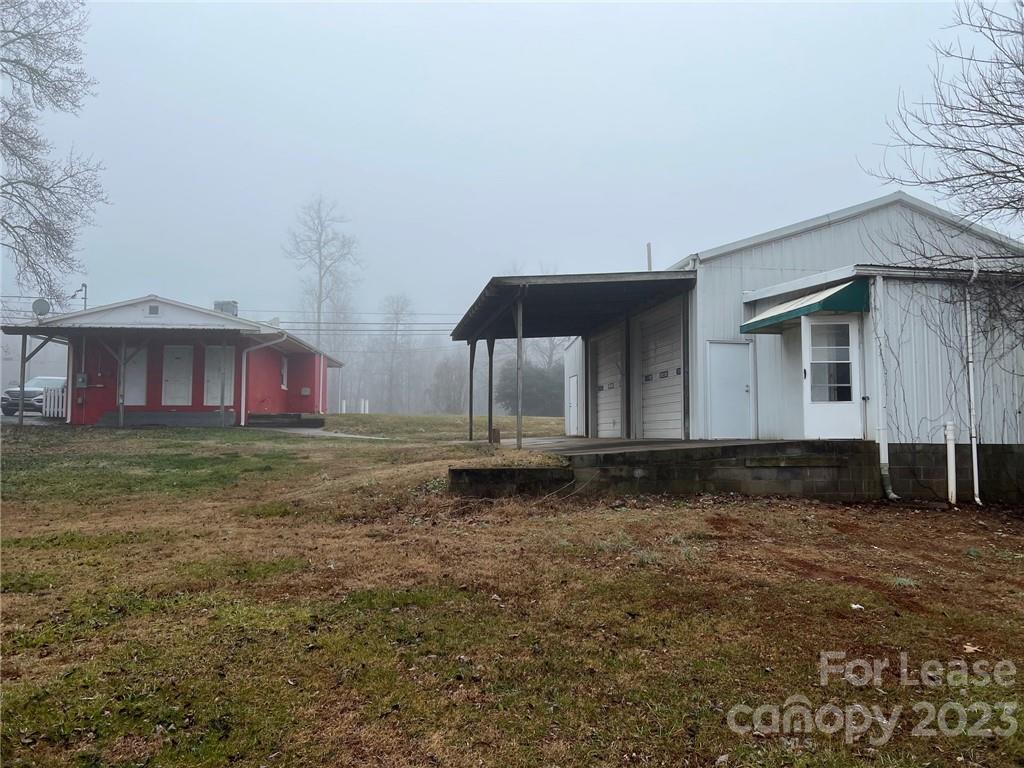 286 Chimney Rock Road Rutherfordton, NC 28139 - Photo 5 of 31 a house view with a backyard space