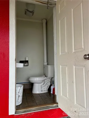 a room with furniture and a window