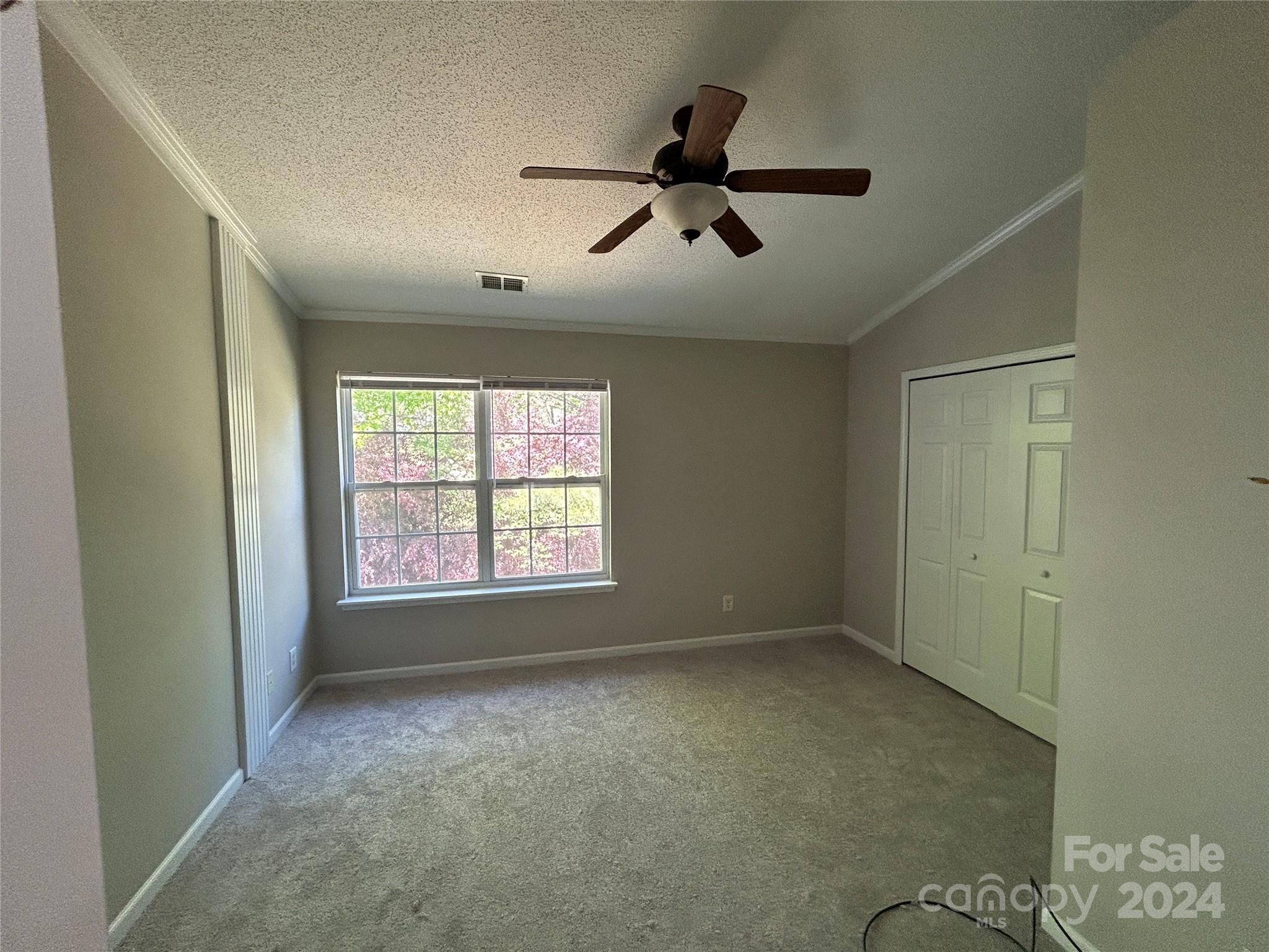 10511 Prairie Ridge Lane Charlotte, NC 28213 - Photo 12 of 17 a view of an empty room with a window