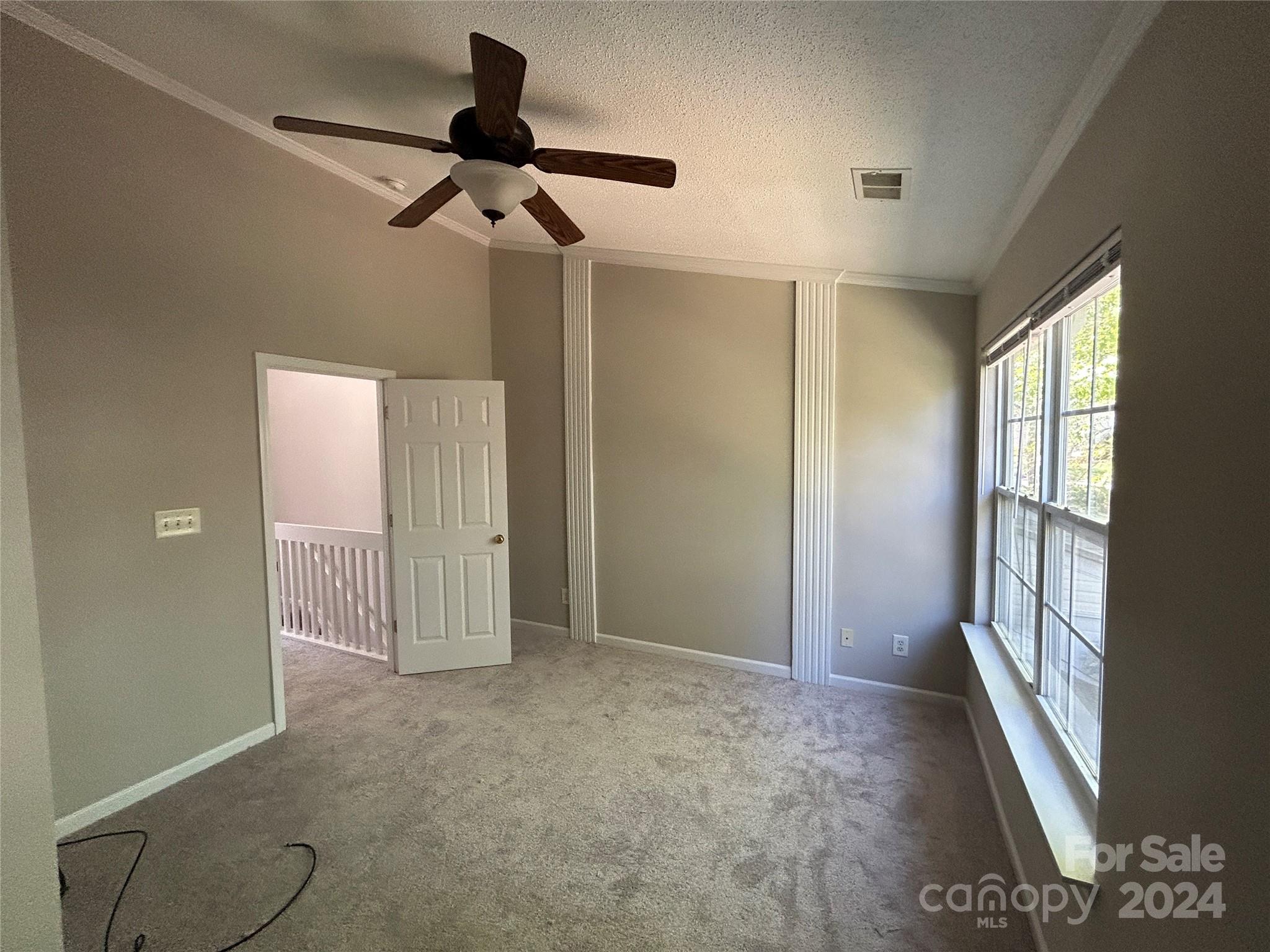 10511 Prairie Ridge Lane Charlotte, NC 28213 - Photo 14 of 17 a view of an empty room and a window