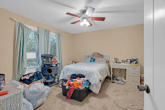 a kitchen with stainless steel appliances granite countertop a refrigerator and a stove