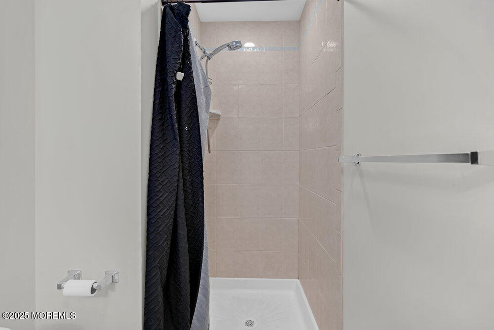 254 Alexander Avenue Howell, NJ 07731 - Photo 20 of 24 a bathroom with a shower