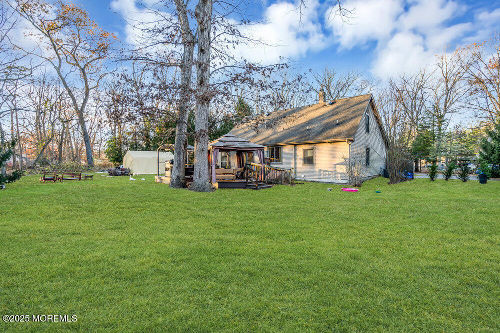 254 Alexander Avenue Howell, NJ 07731 - Photo 6 of 24 a view of house with backyard