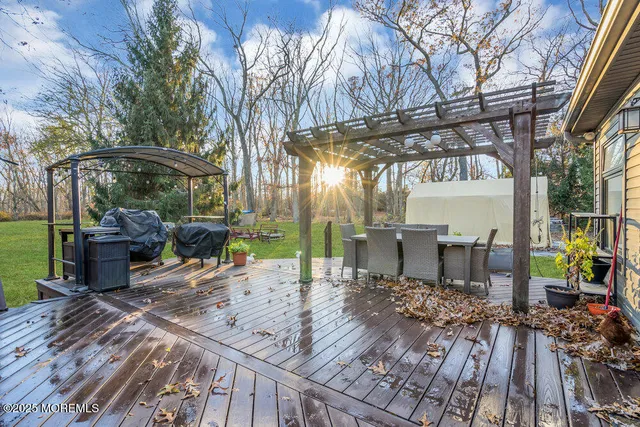 a view of a chairs and table in the patio