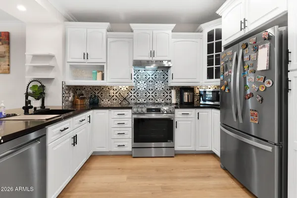 a bathroom with a toilet and a sink