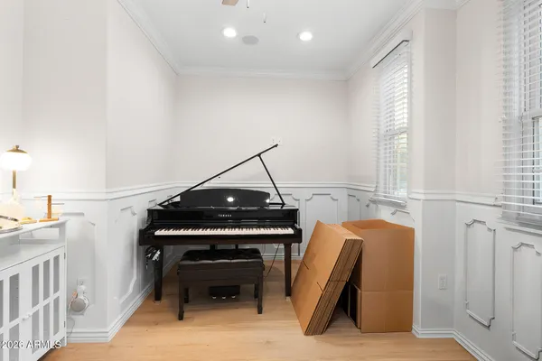 a bed room with a bed and a window