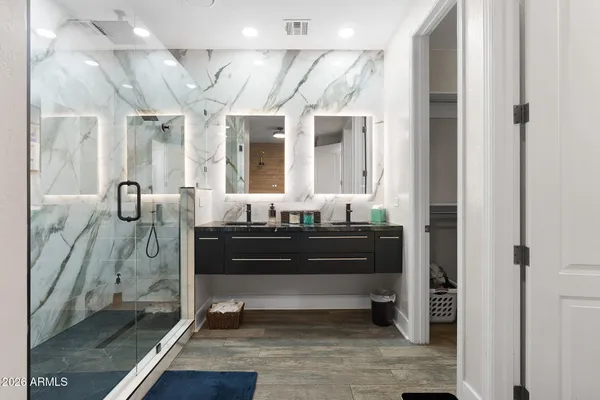 a bathroom with a toilet and sink