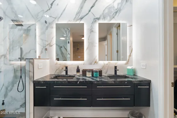 a close view of a stove and a table with chairs