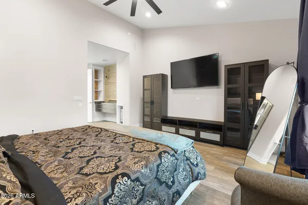 a bathroom with a sink vanity and a mirror