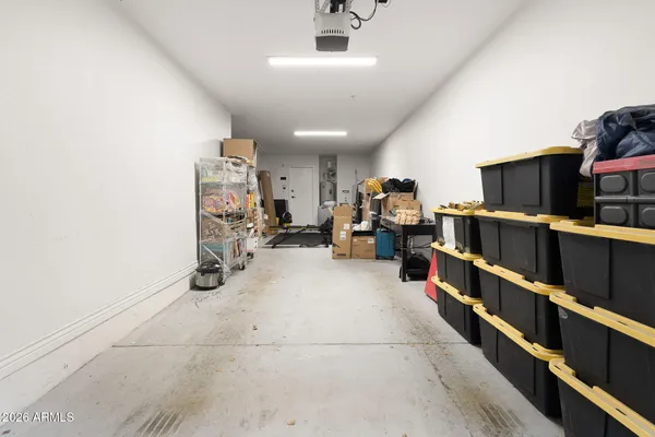 an aerial view of a house with a yard and garden