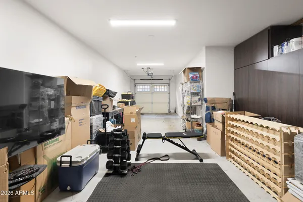 an aerial view of a house with a swimming pool