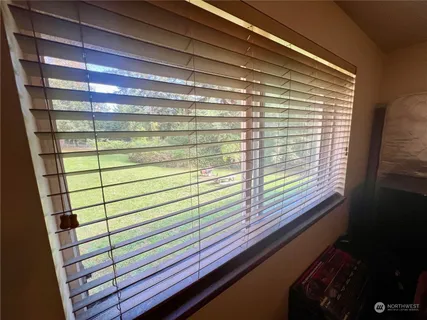 a bathroom with a shower and a sink