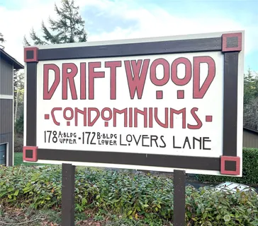 a sign broad in front of a building