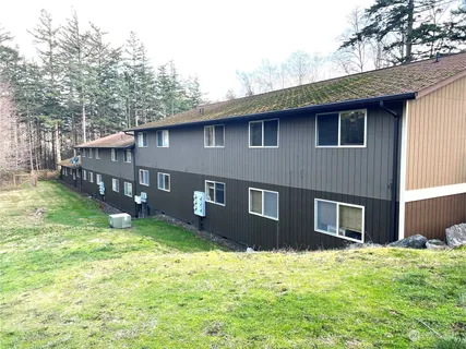 a backyard of a house with lots of green space