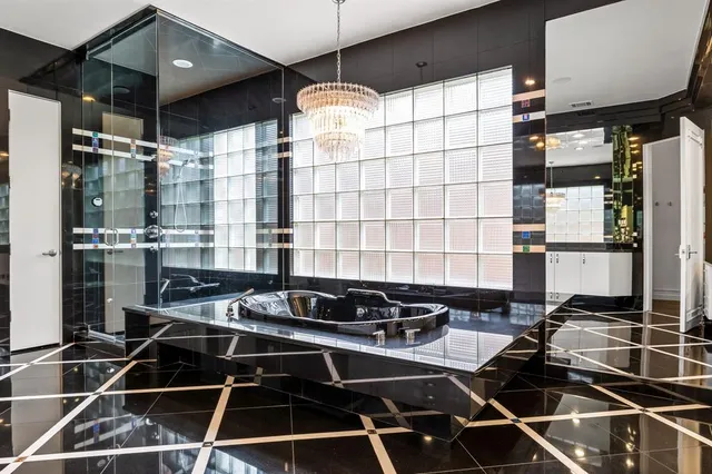 a kitchen with table and chairs