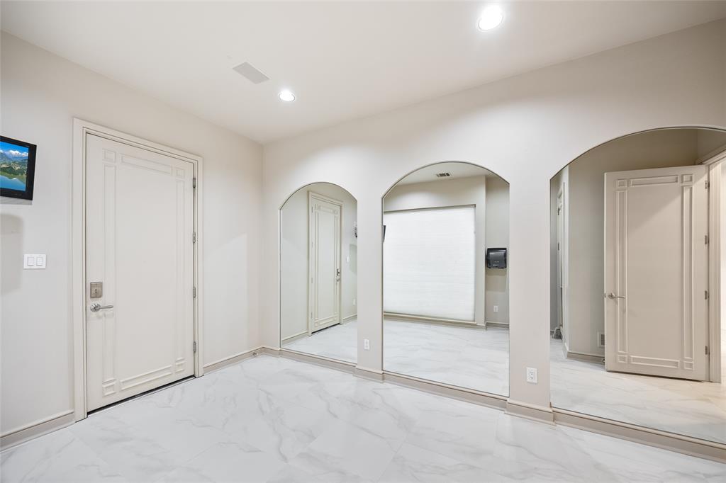 5608 Stone Cliff Court Dallas, TX 75287 - Photo 34 of 35 an empty room with window