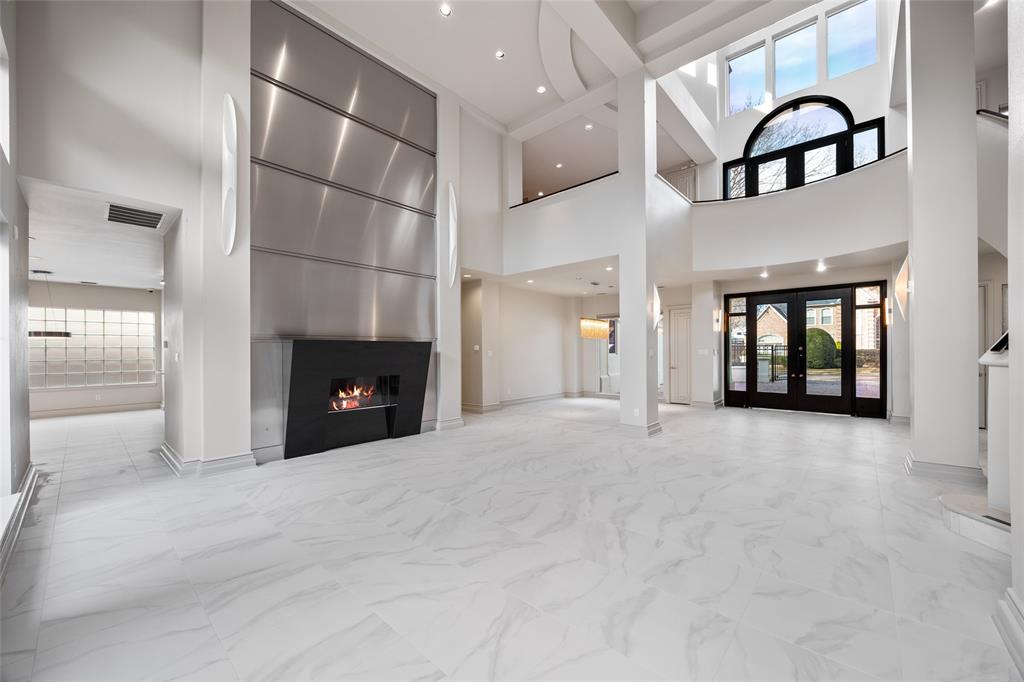 5608 Stone Cliff Court Dallas, TX 75287 - Photo 5 of 35 a view of an empty room