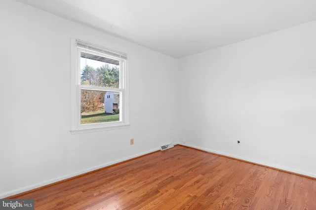 an empty room with window