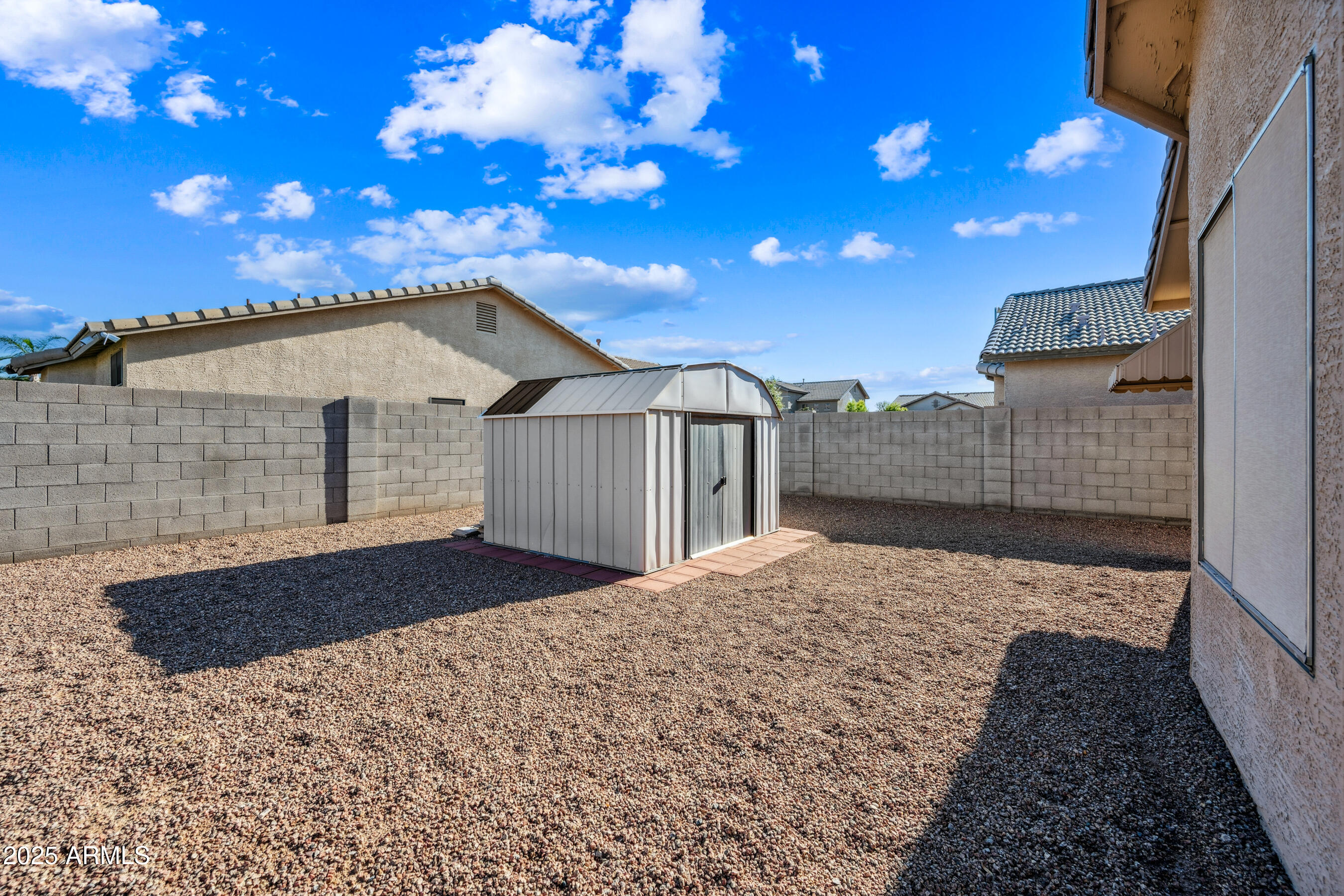 14625 West Redfield Road Surprise, AZ 85379 - Photo 26 of 27 a front view of a house with a yard