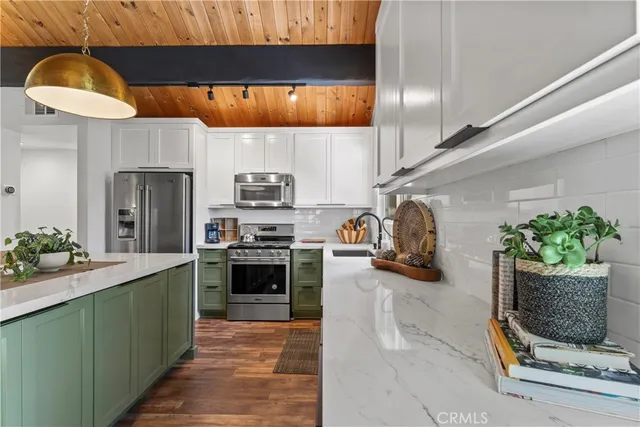 a kitchen with a sink and a window