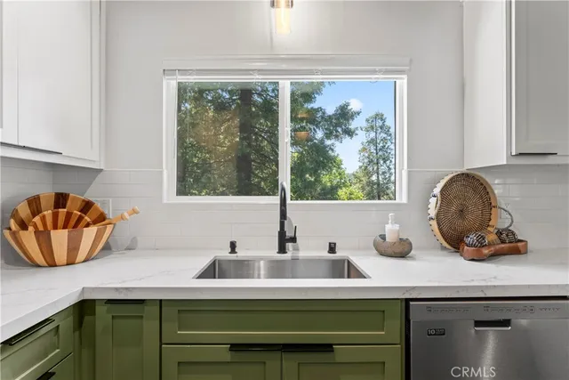 a kitchen with a stove and a microwave