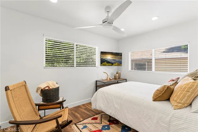 a bedroom with a bed and a walk in closet