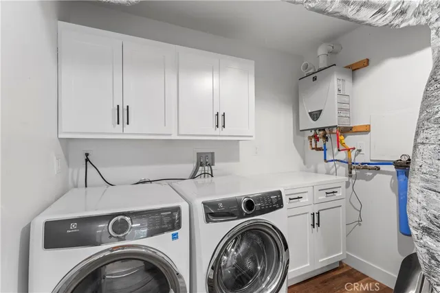 a view of a two chairs in the balcony