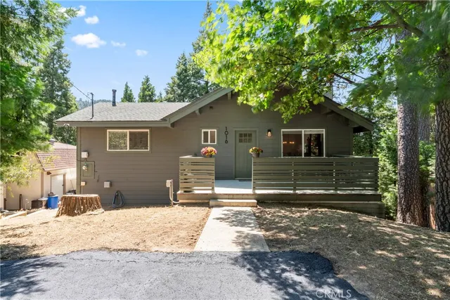 a house with trees in the background