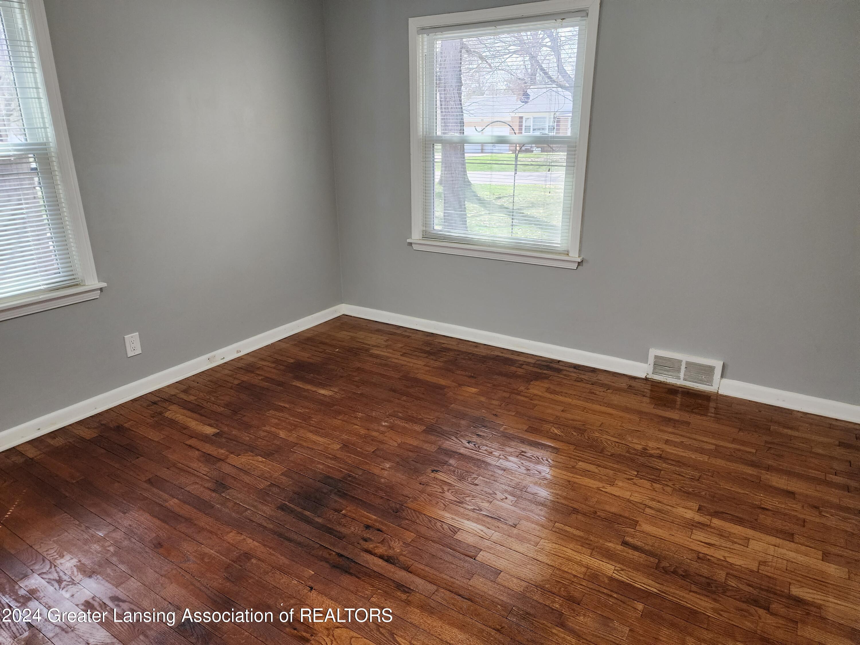 1951 Cumberland Road Lansing, MI 48906 - Photo 16 of 46 Bedroom 2 Main Floor