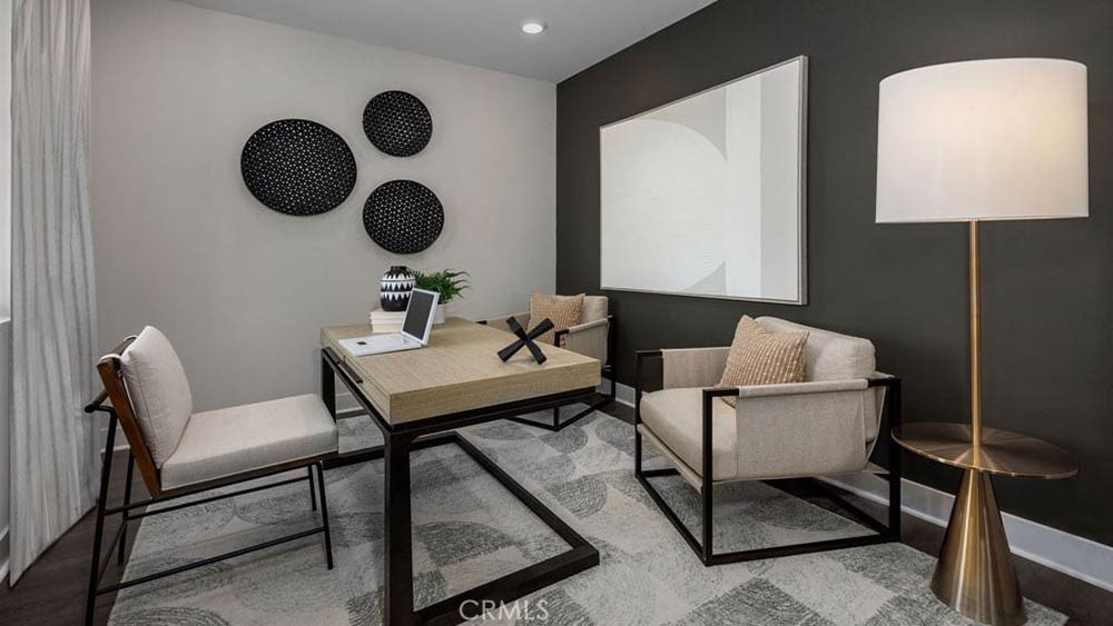 9565 Glenmore Frst Drive Riverside, CA 92508 - Photo 14 of 16 a living room with couches chairs and a mirror next to a window