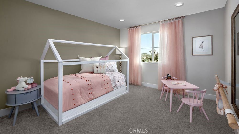 9565 Glenmore Frst Drive Riverside, CA 92508 - Photo 8 of 16 a bedroom with a bed and a chair