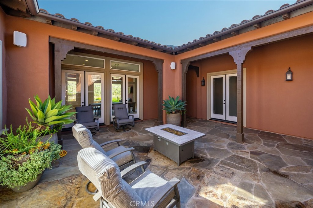 981 Trail View Place Nipomo, CA 93444 - Photo 25 of 56 a view of backyard with outdoor seating and plants