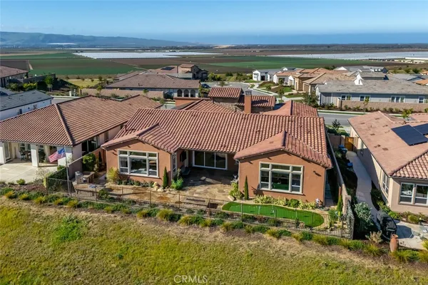 a view of a house with a ocean view