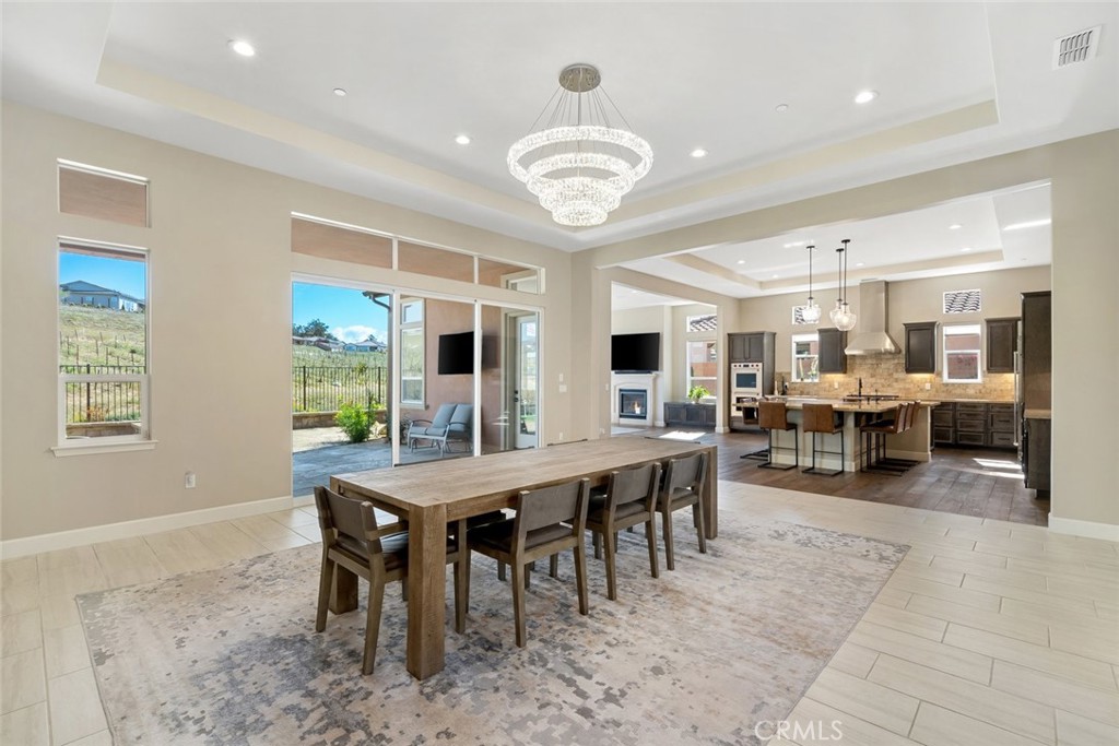981 Trail View Place Nipomo, CA 93444 - Photo 5 of 56 a view of a dining room with furniture