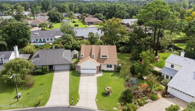 an aerial view of multiple houses
