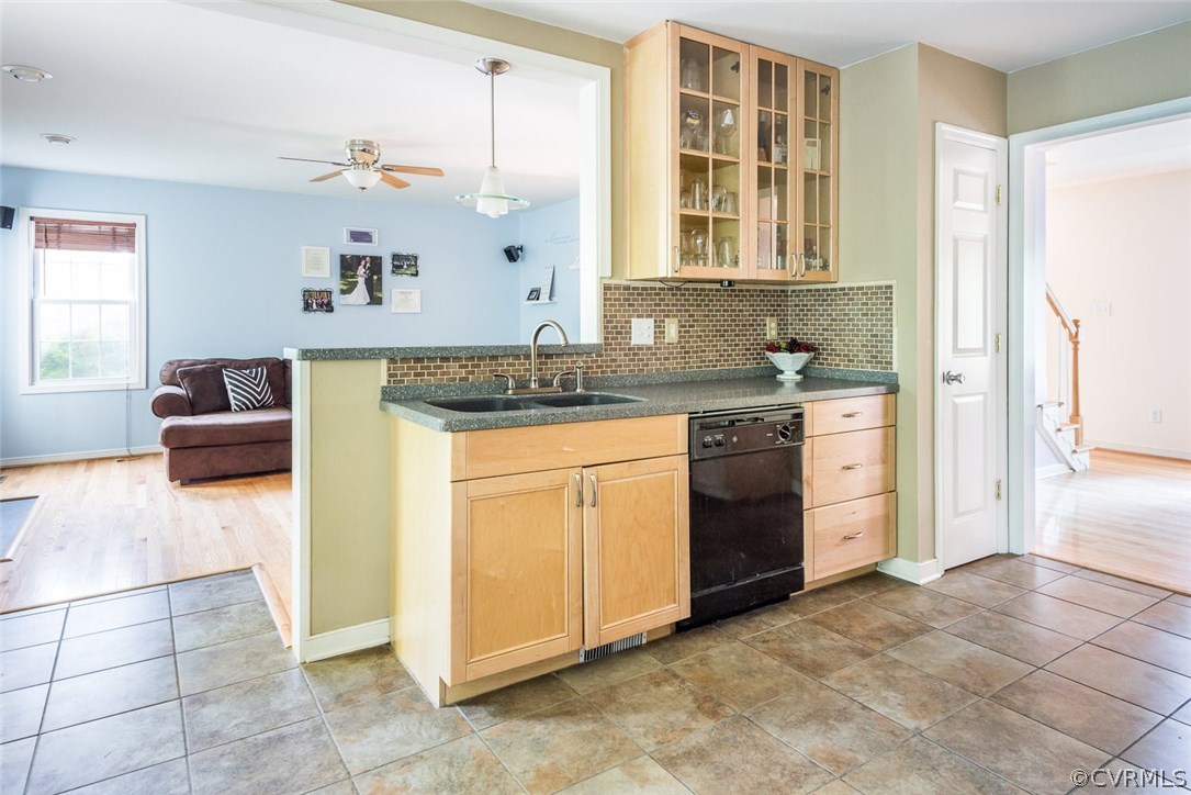 6401 Hackney Court Richmond, VA 23234 - Photo 11 of 26 a kitchen with stainless steel appliances granite countertop a sink stove and cabinets