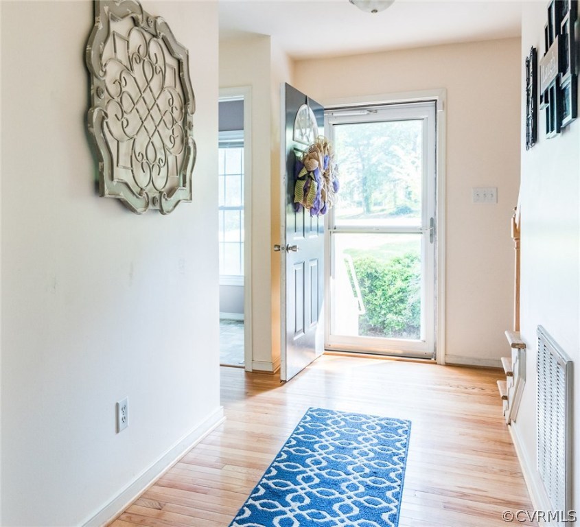 6401 Hackney Court Richmond, VA 23234 - Photo 5 of 26 a view of a room with wooden floor and a window