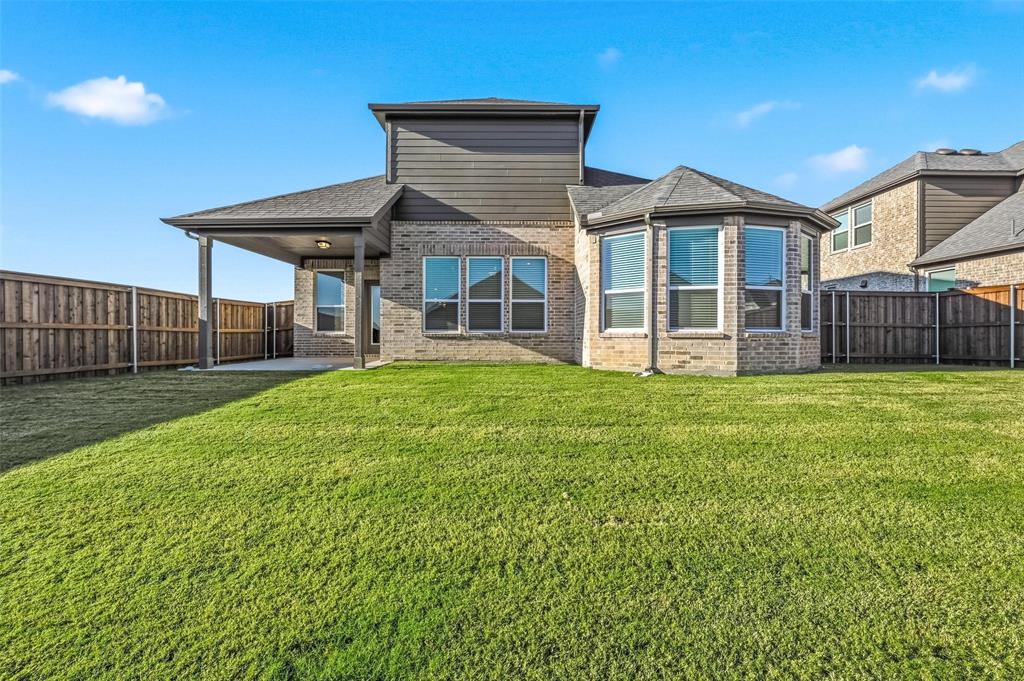 4365 Knight Street Midlothian, TX 76065 - Photo 27 of 33 a view of a house with a yard and sitting area