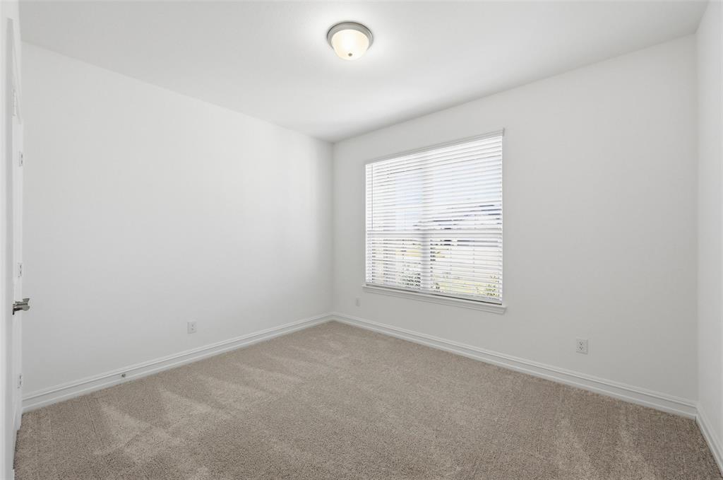 4365 Knight Street Midlothian, TX 76065 - Photo 10 of 33 an empty room with a window