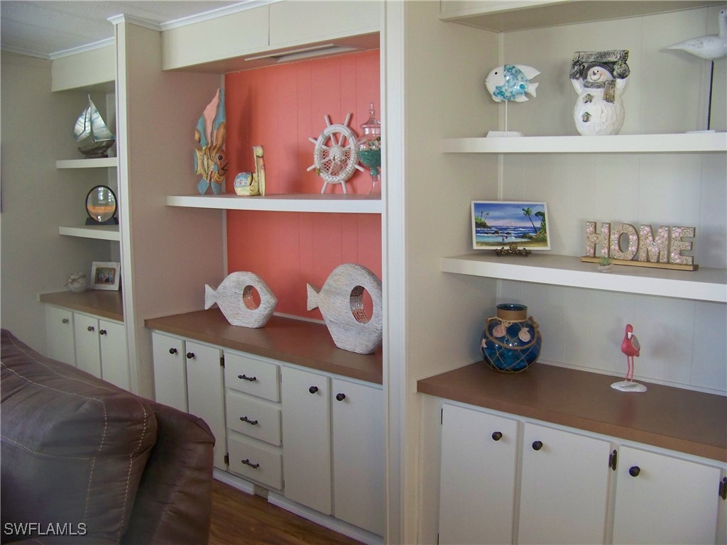 15550 Burnt Store Road, Unit 63 Punta Gorda, FL 33955 - Photo 12 of 47 a kitchen with cabinets and window