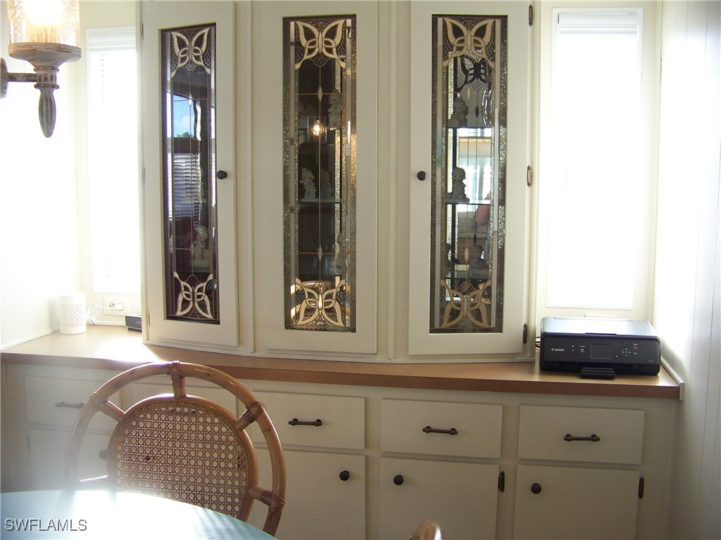 15550 Burnt Store Road, Unit 63 Punta Gorda, FL 33955 - Photo 14 of 47 a bathroom with a sink and a mirror