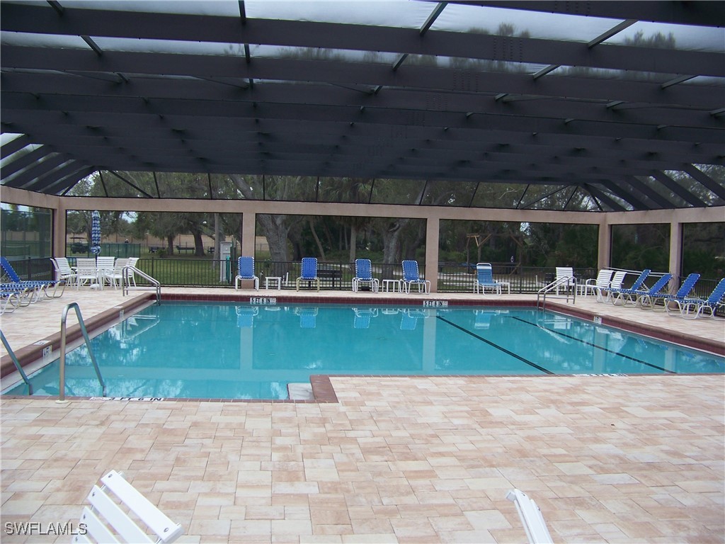 15550 Burnt Store Road, Unit 63 Punta Gorda, FL 33955 - Photo 38 of 47 a view of a swimming pool with a patio
