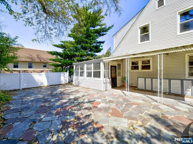 a view of a house with a patio