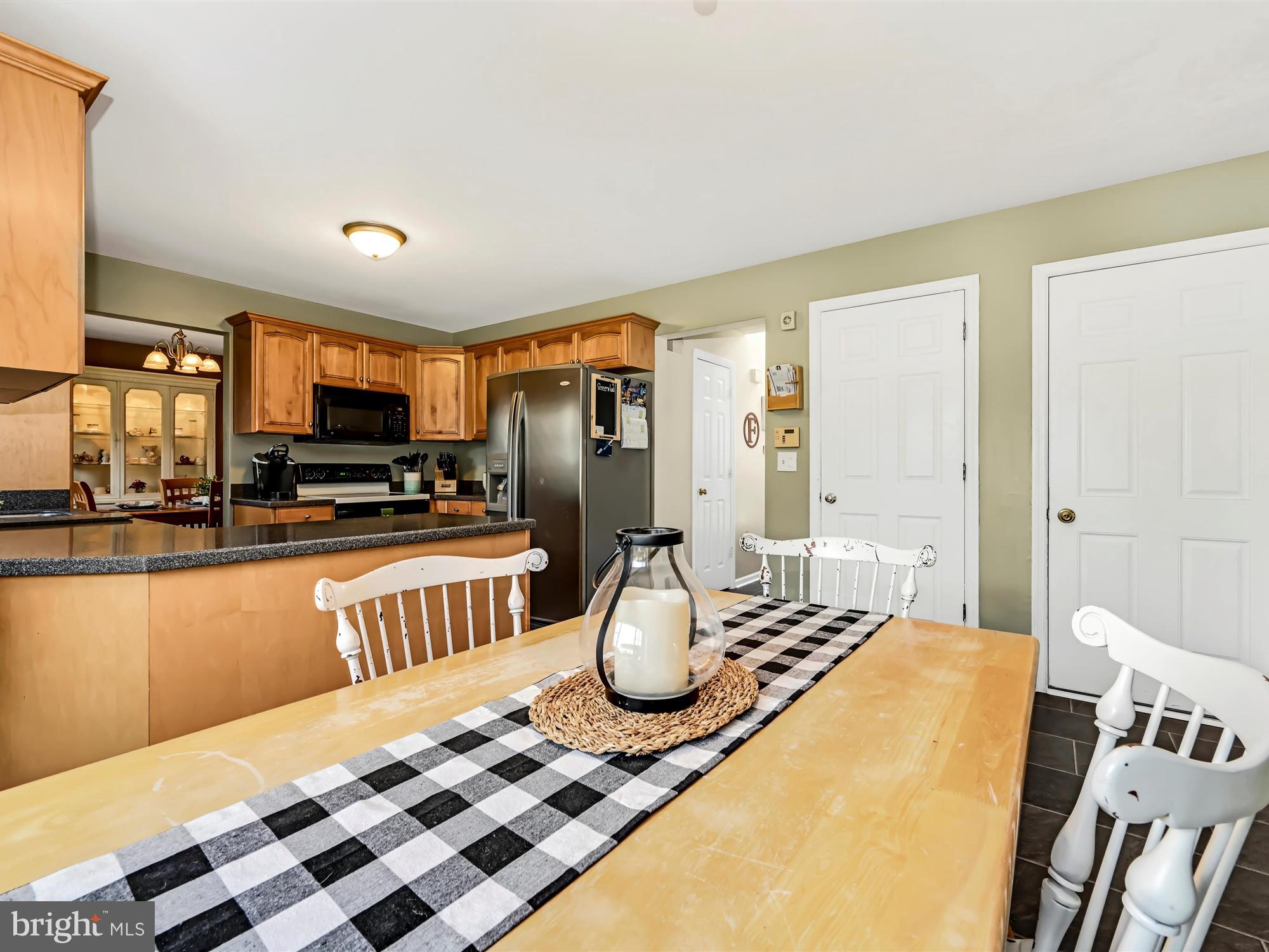 205 Village Spring Lane Reinholds, PA 17569 - Photo 14 of 29 a kitchen with a sink appliances and cabinets