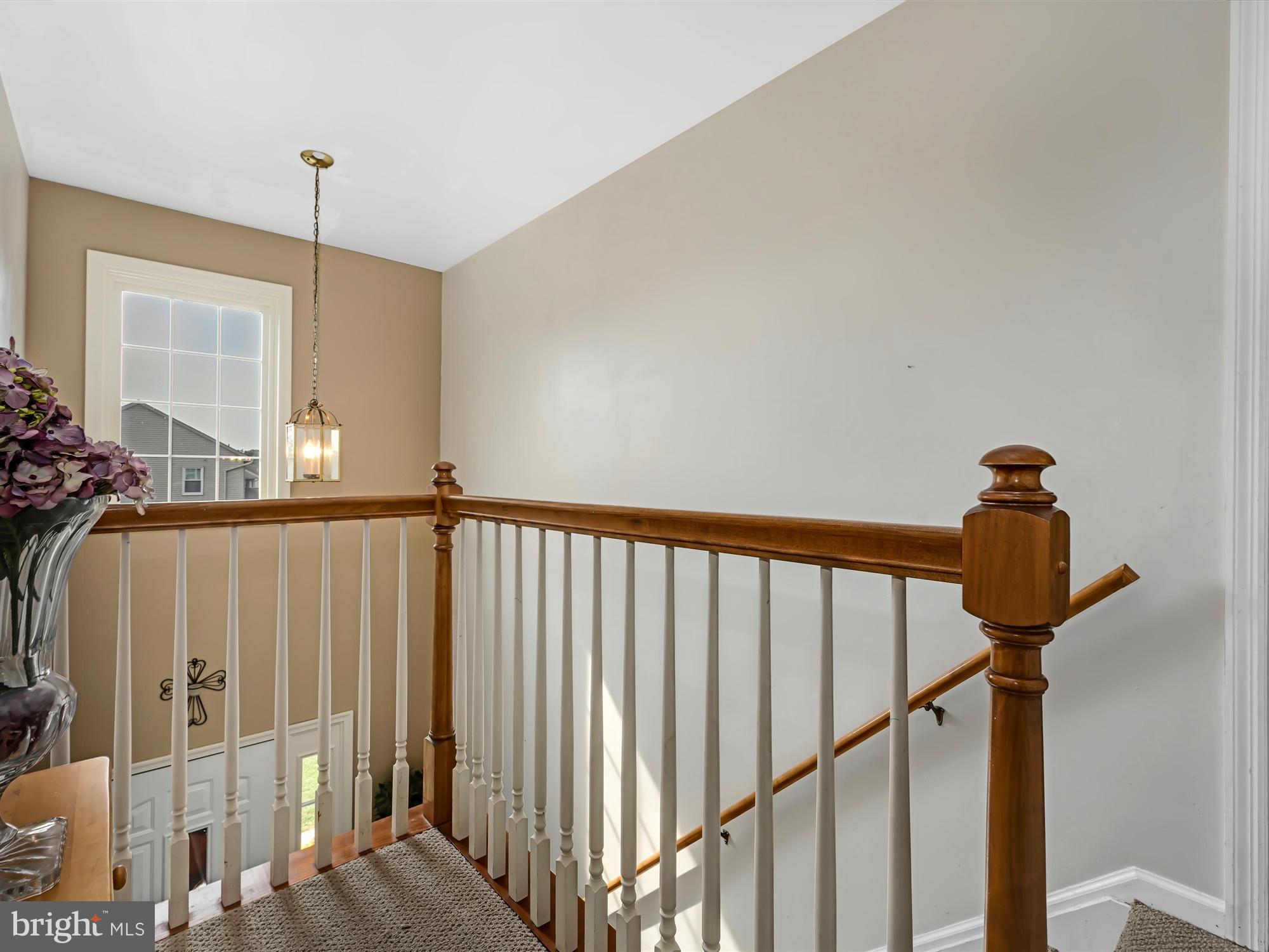 205 Village Spring Lane Reinholds, PA 17569 - Photo 18 of 29 a view of a hallway with windows