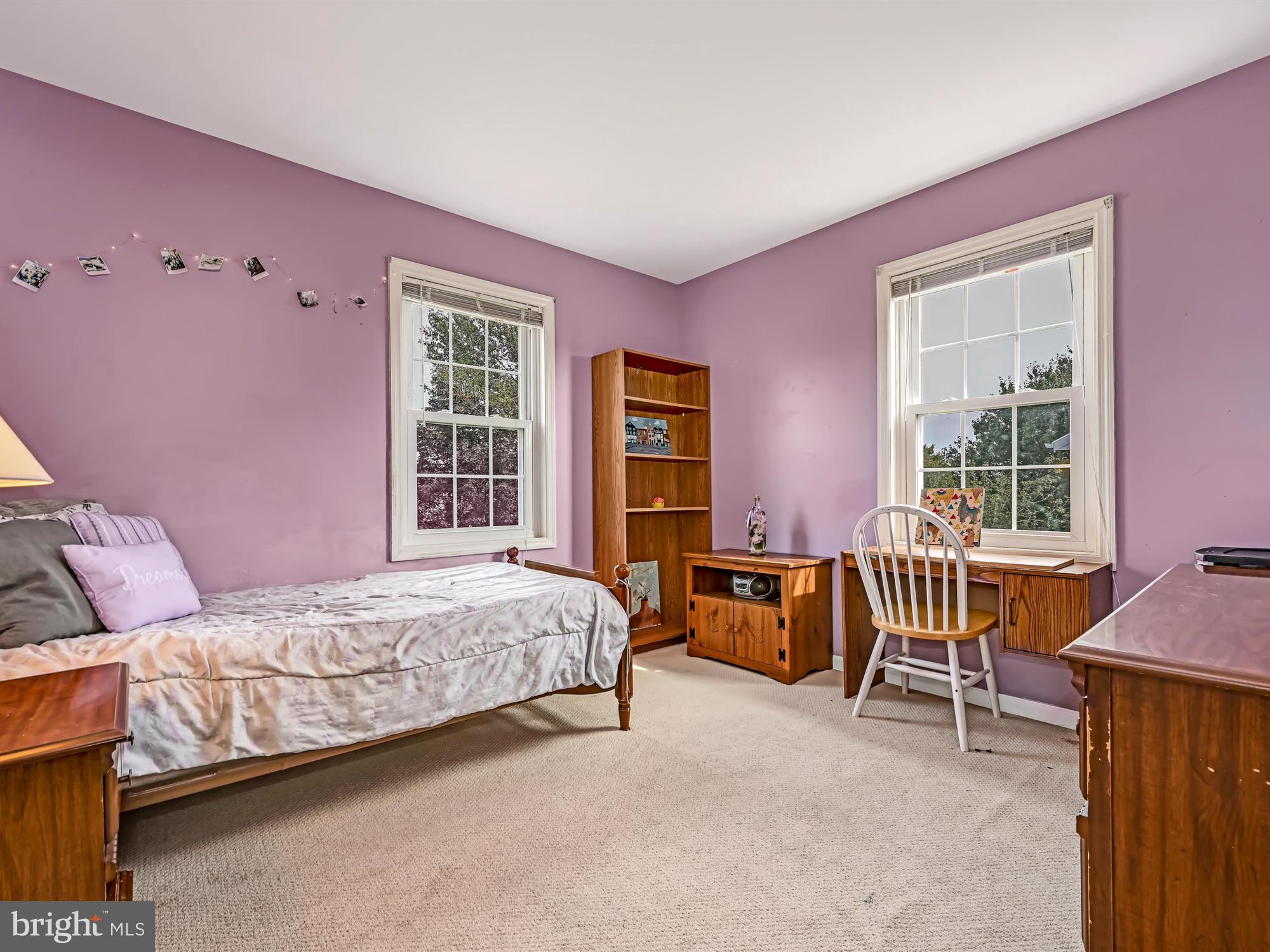 205 Village Spring Lane Reinholds, PA 17569 - Photo 24 of 29 a bedroom with a bed and a table chair